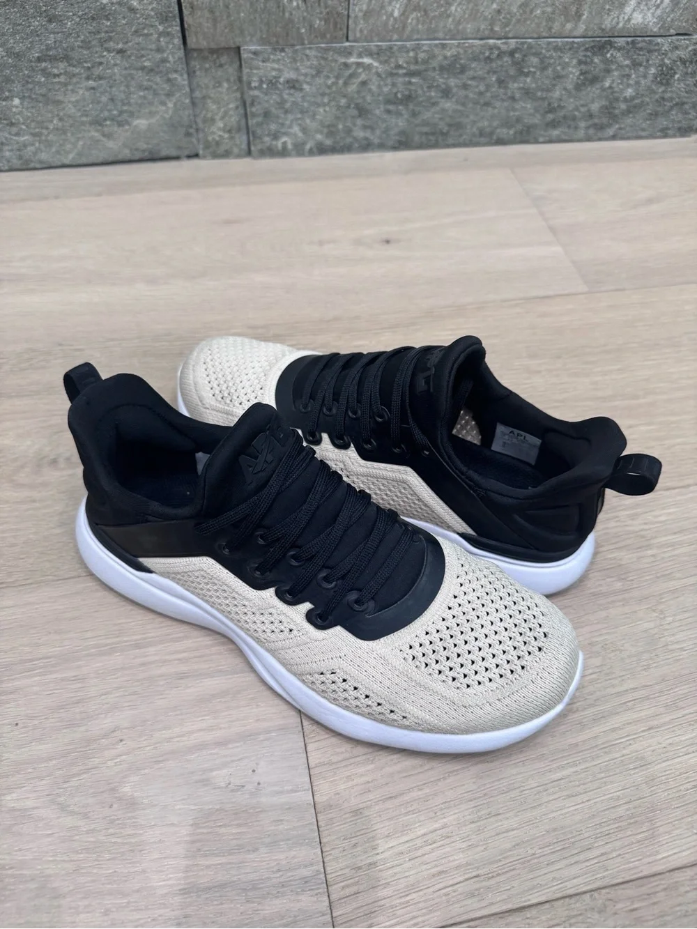APL Two-Tone Knit Sneakers in Black and Cream